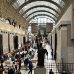 A crowd of visitors inside the Musée d’Orsay in Paris